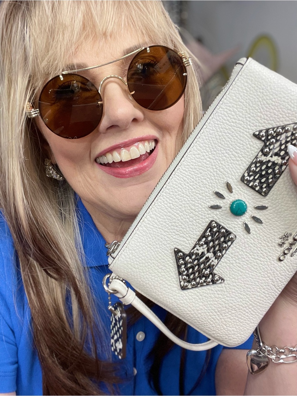 COACH Chalk Pebble Leather Western Rivet Wristlet